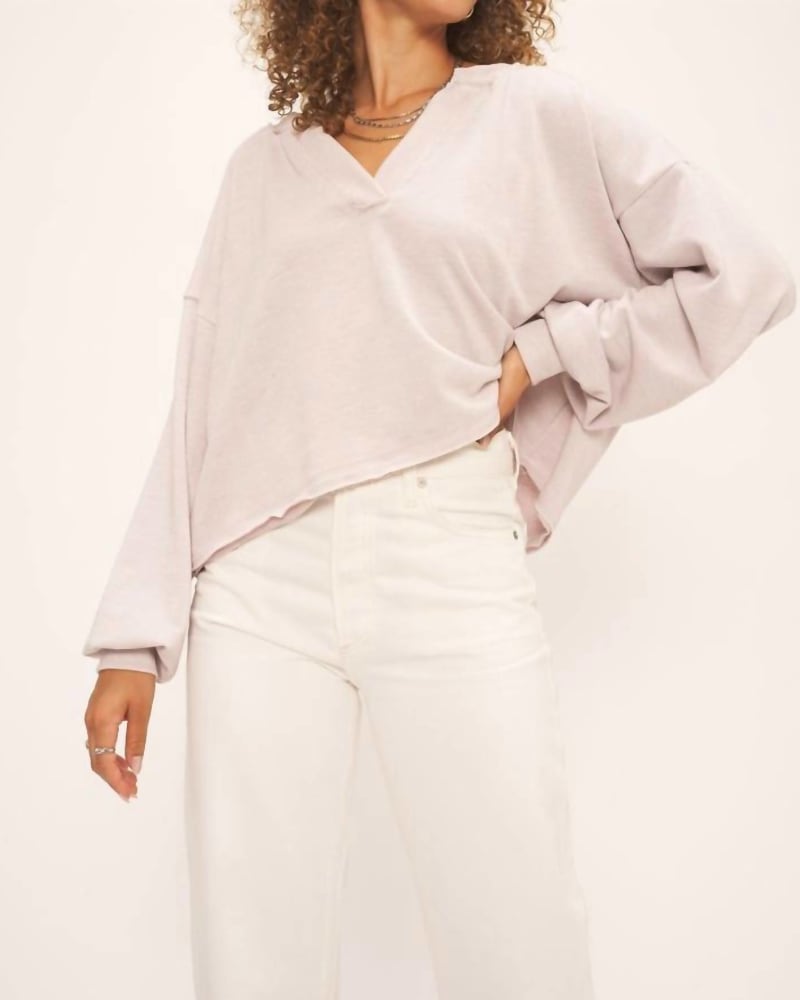 Front of a model wearing a size L Charlie Notch Neck Sweatshirt in Lilac Stone in Lilac Stone by PROJECT SOCIAL T. | dia_product_style_image_id:333467